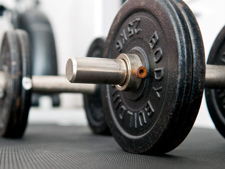 Bumper Plates vs Rubber Plates