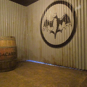 Bacardi rustic scenic build wood-stained floor faux-rust corrugated metal