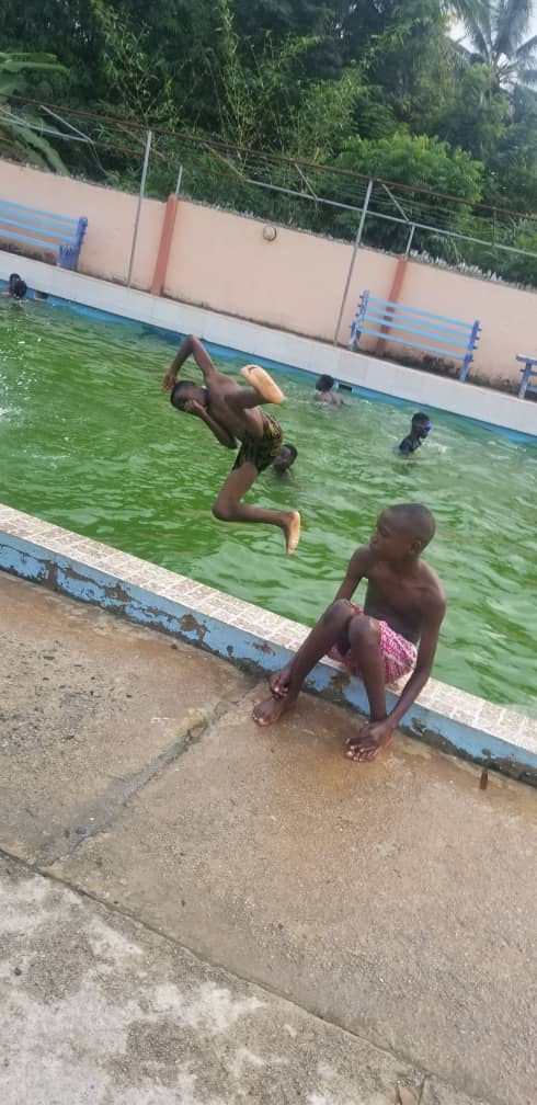 Sankofa children in pool, Ghana