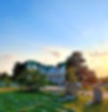 Das Hauptgebäude am Chatêau Bernhart in der Nachmittagssonne im Juni aus der Damanhur Meditationsspirale aus fotografiert von Noah Archer