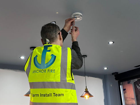 fire alarm install teamt member.jpg