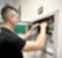 alarm engineer testing fire alarm panel.jpg