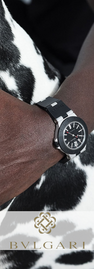 Close-up di un orologio Bulgari al polso con sfondo di pelliccia di cane Dalmata. Scatto realizzato in collaborazione con Animal Spot Milano.