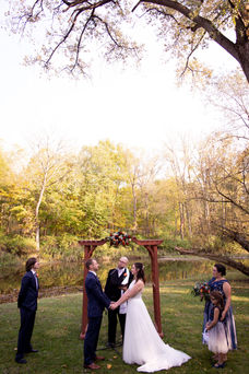 outdoor wedding ceremony on buffalo creek at obriens sleepy hollow east aurora ny