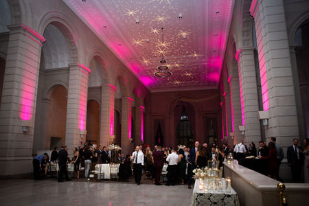 night sky projected on high ceilings inside Admiral Room wedding reception