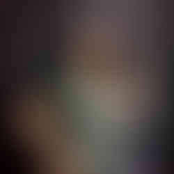 round woman in lingerie playing with her hair