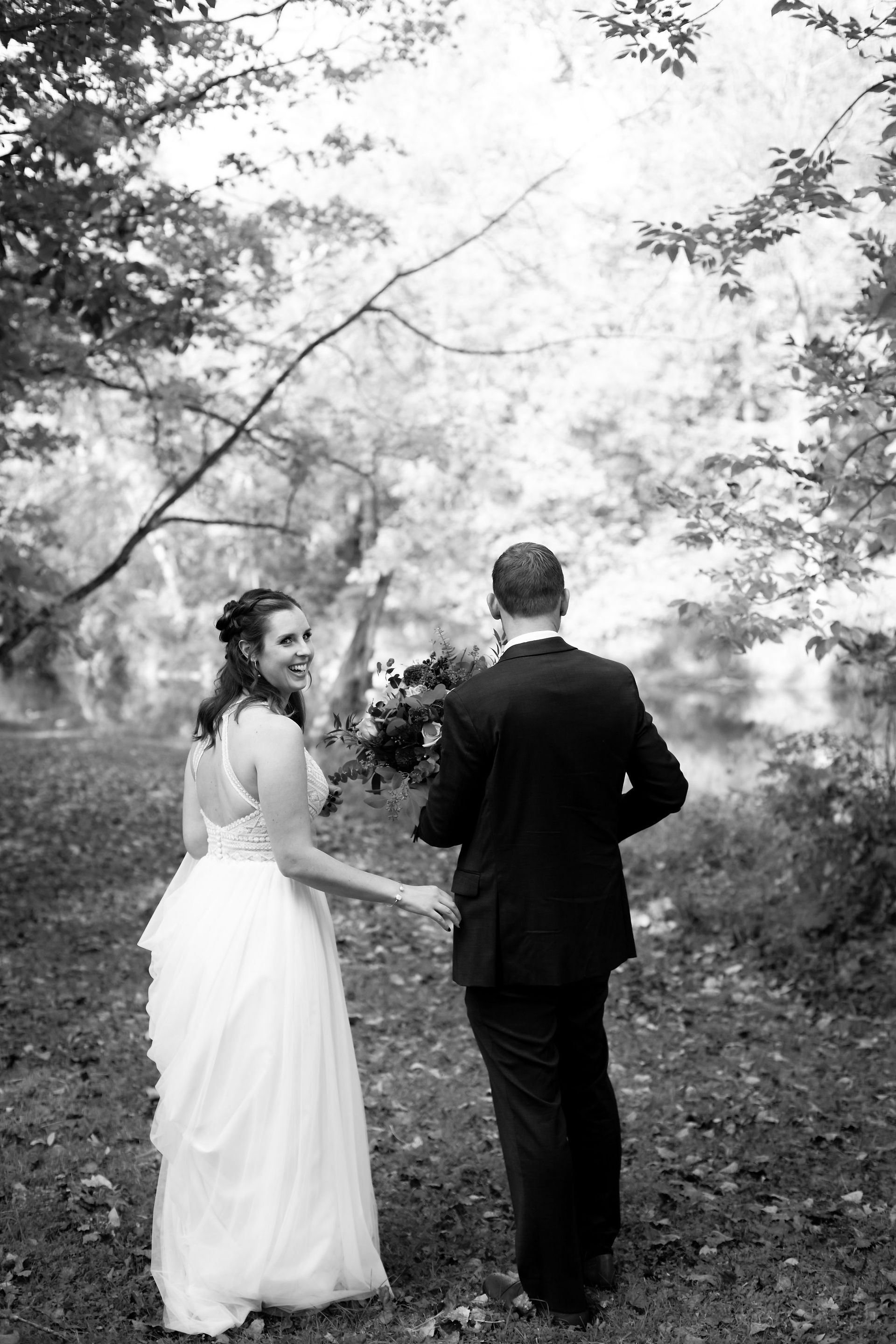 bride groom walking portrait at outdoor wedding venue obriens sleepy hollow east aurora ny