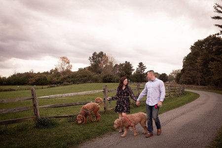 couple walking dog along the path at Knox Farm East Aurora