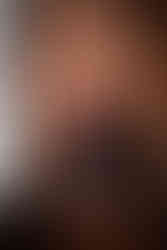 woman in red bra playing with her skirt