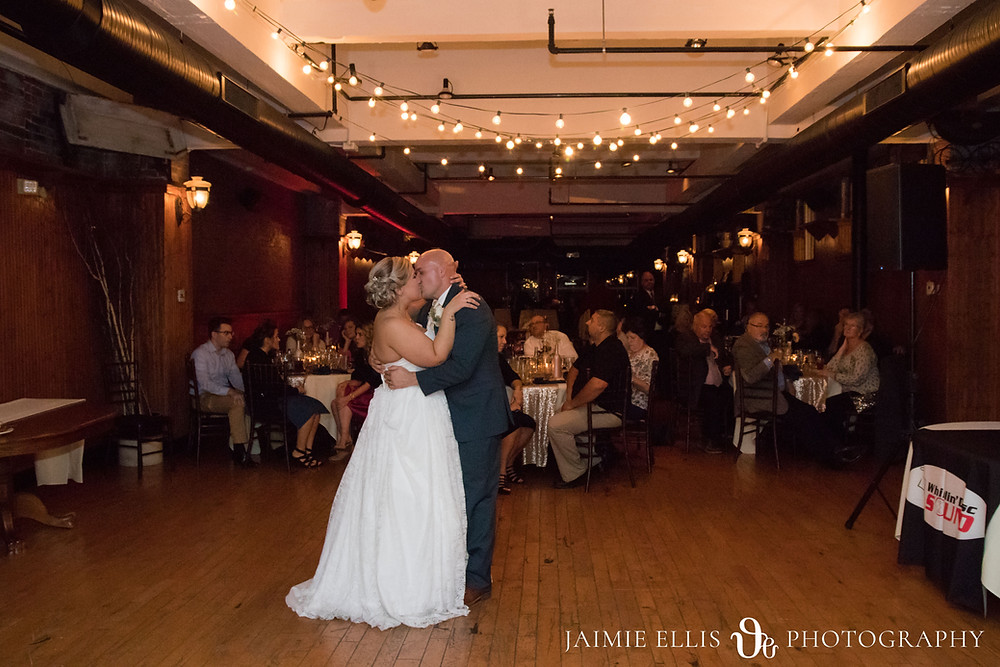 bride and groom's first dance in the Courtyard Room at the Hotel at the Lafayette in Buffalo NY