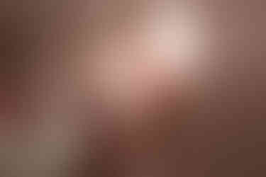 film photo of mom twirling toddler daughter around