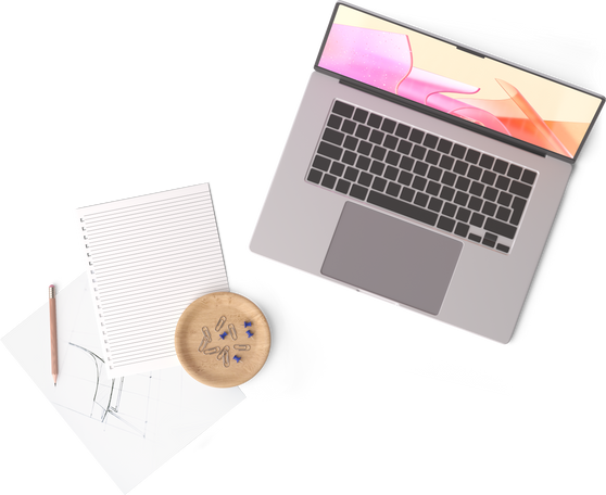 top view of laptop, two sheets of paper, cup of tea, pencil and pins