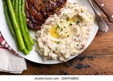 Dinner: NY Strip Steak w/Béarnaise,  Stuffed Chicken Breast, Fluffy Mashed Potatoes, Salad & Soup, Bread & Dessert