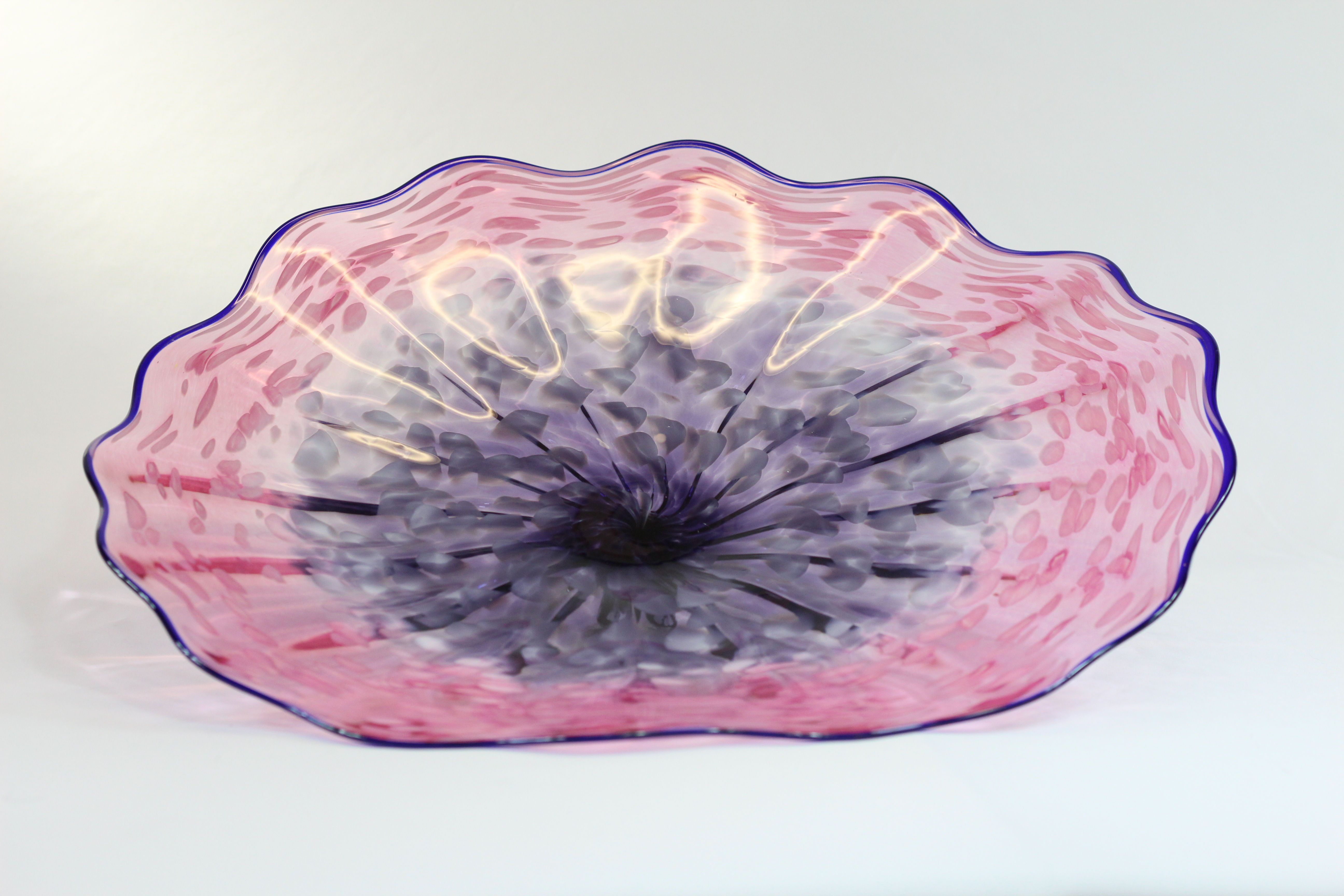 Pink, Purple and White Wall Plate with a Blue Lip Wrap