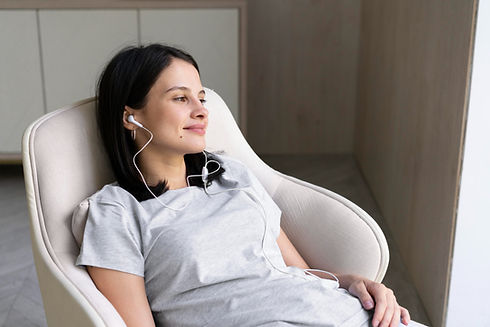 young-woman-listening-music-home.jpg