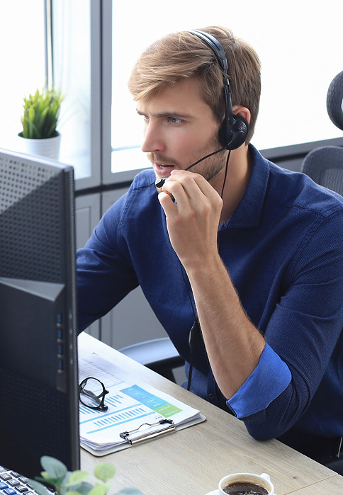 happy-young-male-customer-support-executive-working-office.jpg