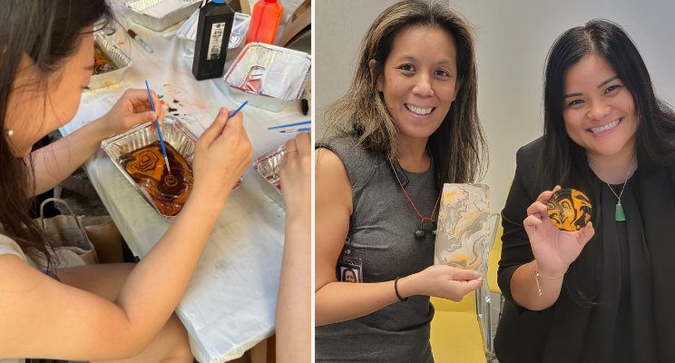 (left) woman participating in a suminagashi in-person event (right) work colleagues holding their suminagashi art works in paper and wood coaster