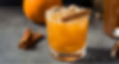spiced cocktail with cinnamon sticks