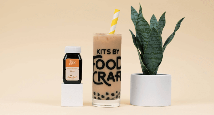 brown sugar bubble tea with brown sugar syrup and a snake plant