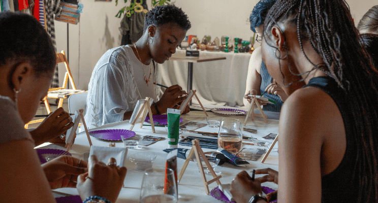 a group of friend involved in a creative event