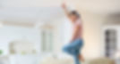 woman dancing with her headphones