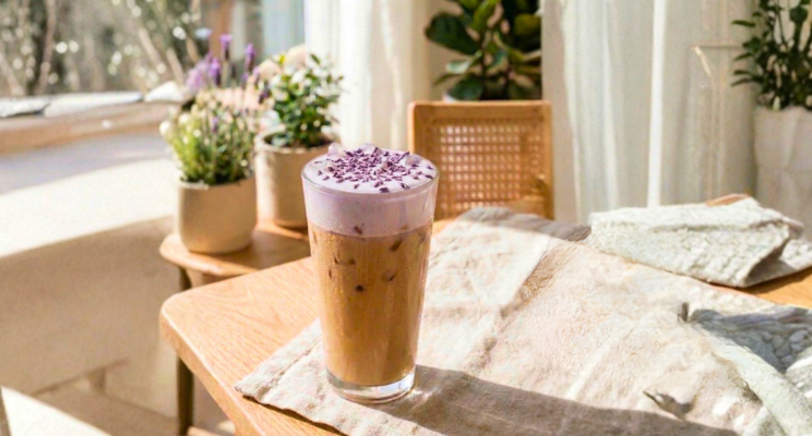 ube latter drink placed on top of a table