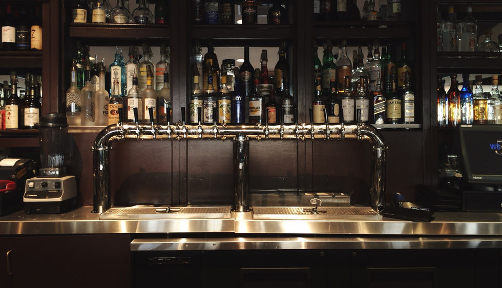 Bar with bottles of alcohol beverages