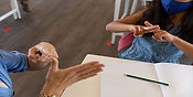 Students performing ASL
