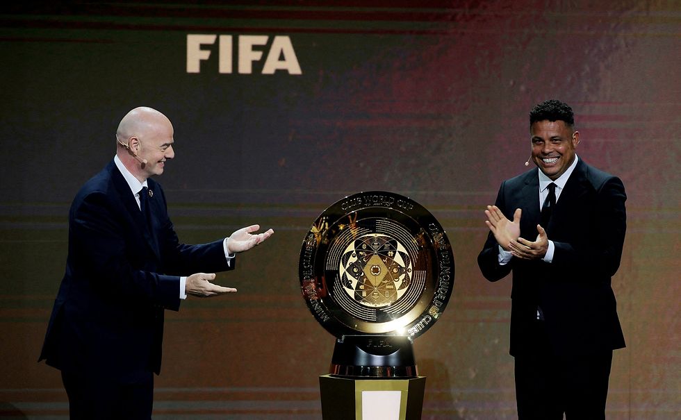 FIFA President Gianni Infantino and Ronaldo Present the FIFA Club World Cup Trophy.