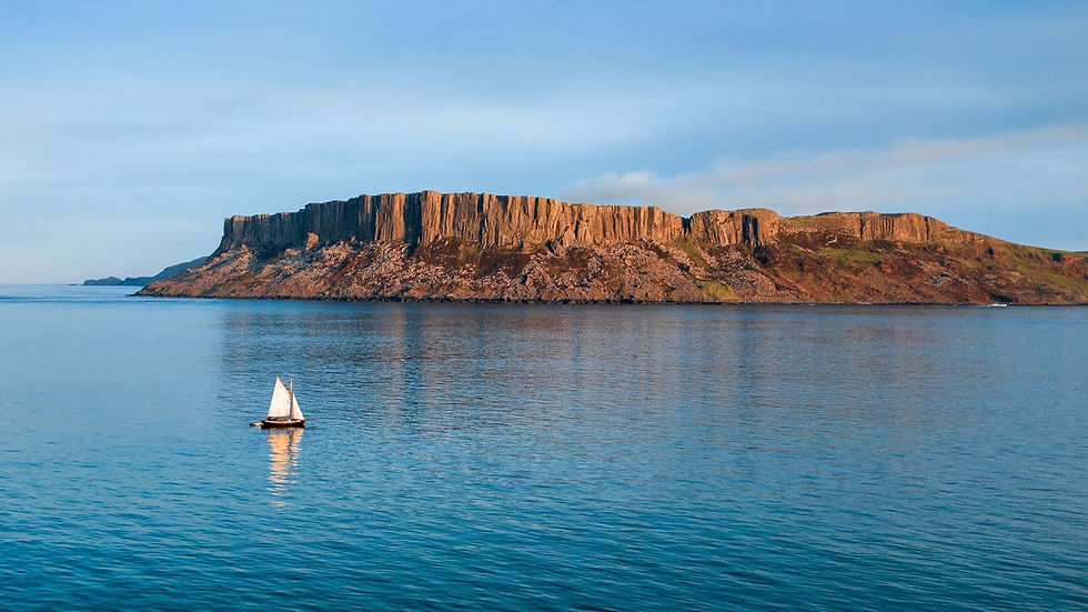 A boat sailing in Ballycastle Strand