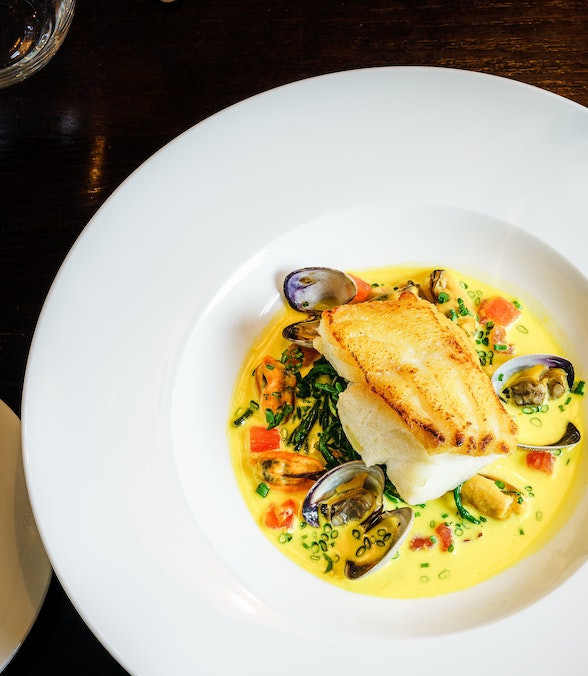 Dish of seafood with fish and mussels.