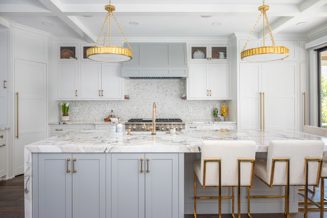 Use custom joinery to disguise pantry doors so they blend seamlessly with surrounding cabinetry, whether in a Hamptons-inspired or minimalist design.