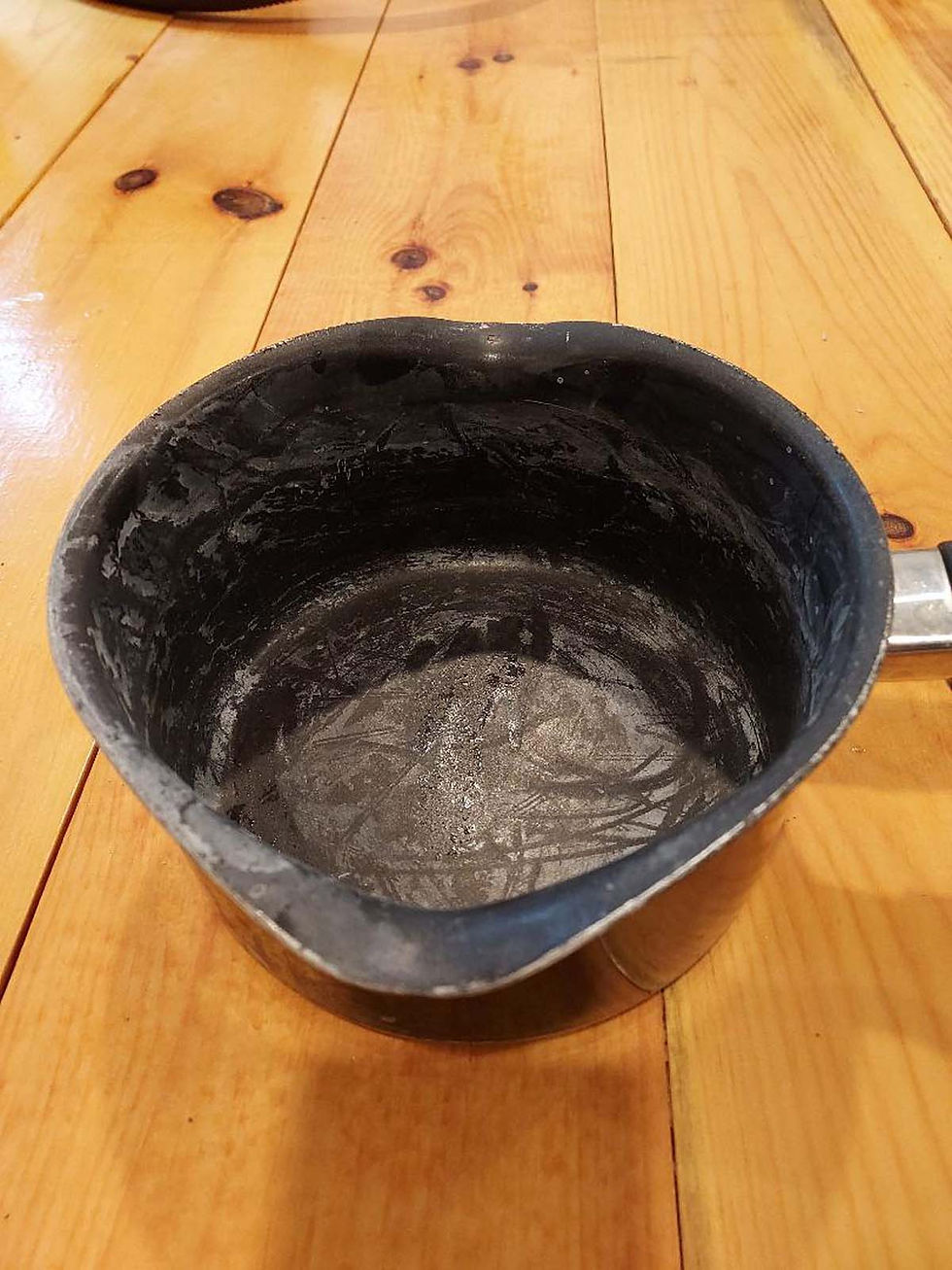 white scale on pot
