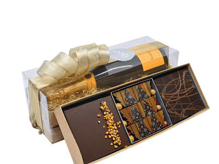 Aquest Nadal, sorprèn amb regals originals i artesans de Bocí Barcelona: caixes personalitzades, torrons premium i figures de xocolata Valrhona. Qualitat, detall i sabor per celebrar moments compartits.