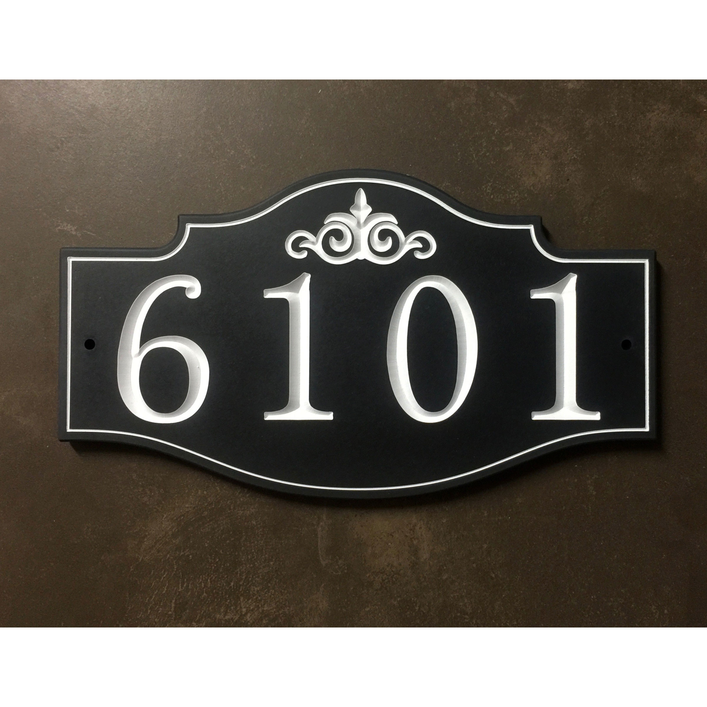 Victorian address plaque featuring V-carved house numbers on a weatherproof, stone-look solid surface material.