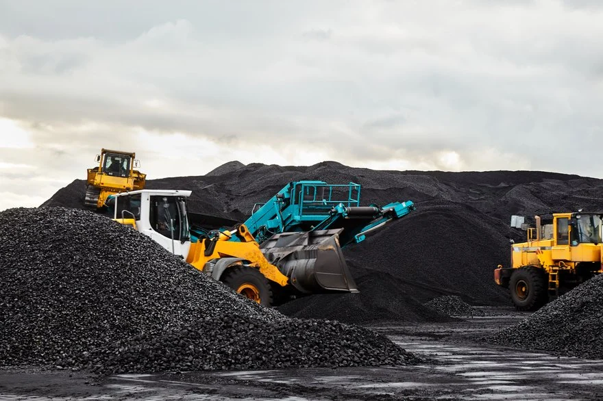 Two_industrial_sized_trucks_in_a_mining_area_w.width-880.jpg.webp