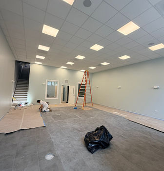 Finished commercial lobby in Chicago with ACT ceiling and new flooring