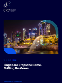 Night view of Singapore's skyline with Merlion statue spouting water. Text: "Singapore Drops the Name, Shifting the Game" on blue background.