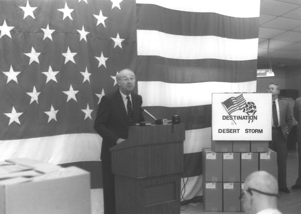 Man speaking at podium