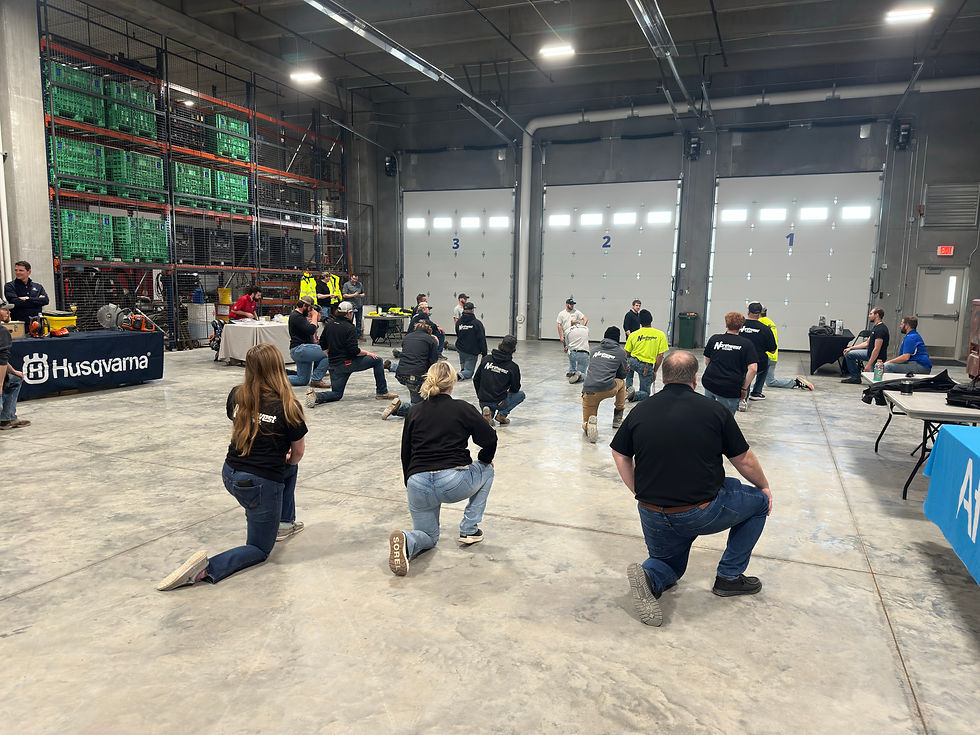 Team stretches in shop