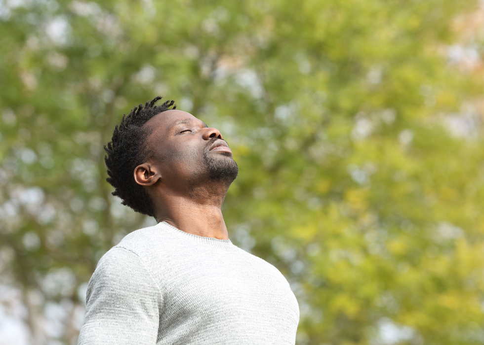 a man taking a pause and a deep breath