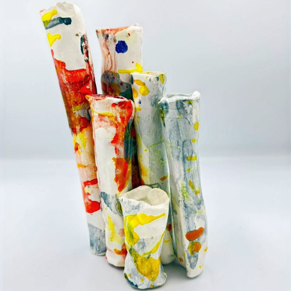 Colorful abstract ceramic bud vases cluster