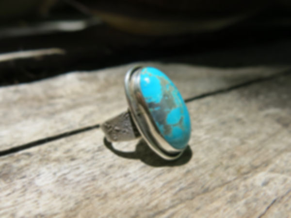 Oval shaped Turquoise with textured band 1