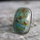 Thumbnail: Rectangular shaped Turquoise with sterling silver textured band
1