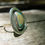 Thumbnail: Small striking triangular Turquoise stone with simple band
2