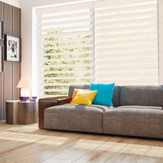 Light filtering sheer fabric shade in the living room.  