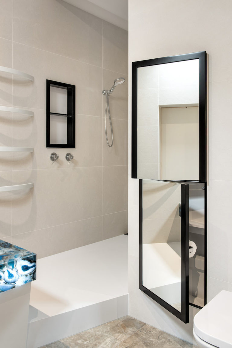 A dress mirror with oposite opening doors makes the most of the available storage space whilst maintaining efficient access points