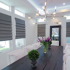 Close-up of Roman shade folds and high-quality fabric texture.