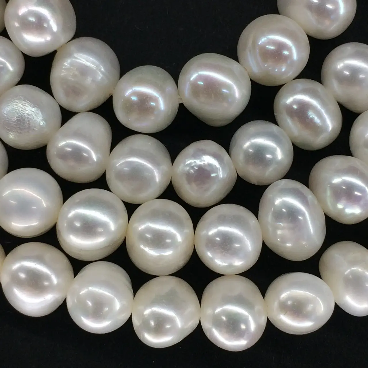 Beads from white river pearls, bead 9-10 mm