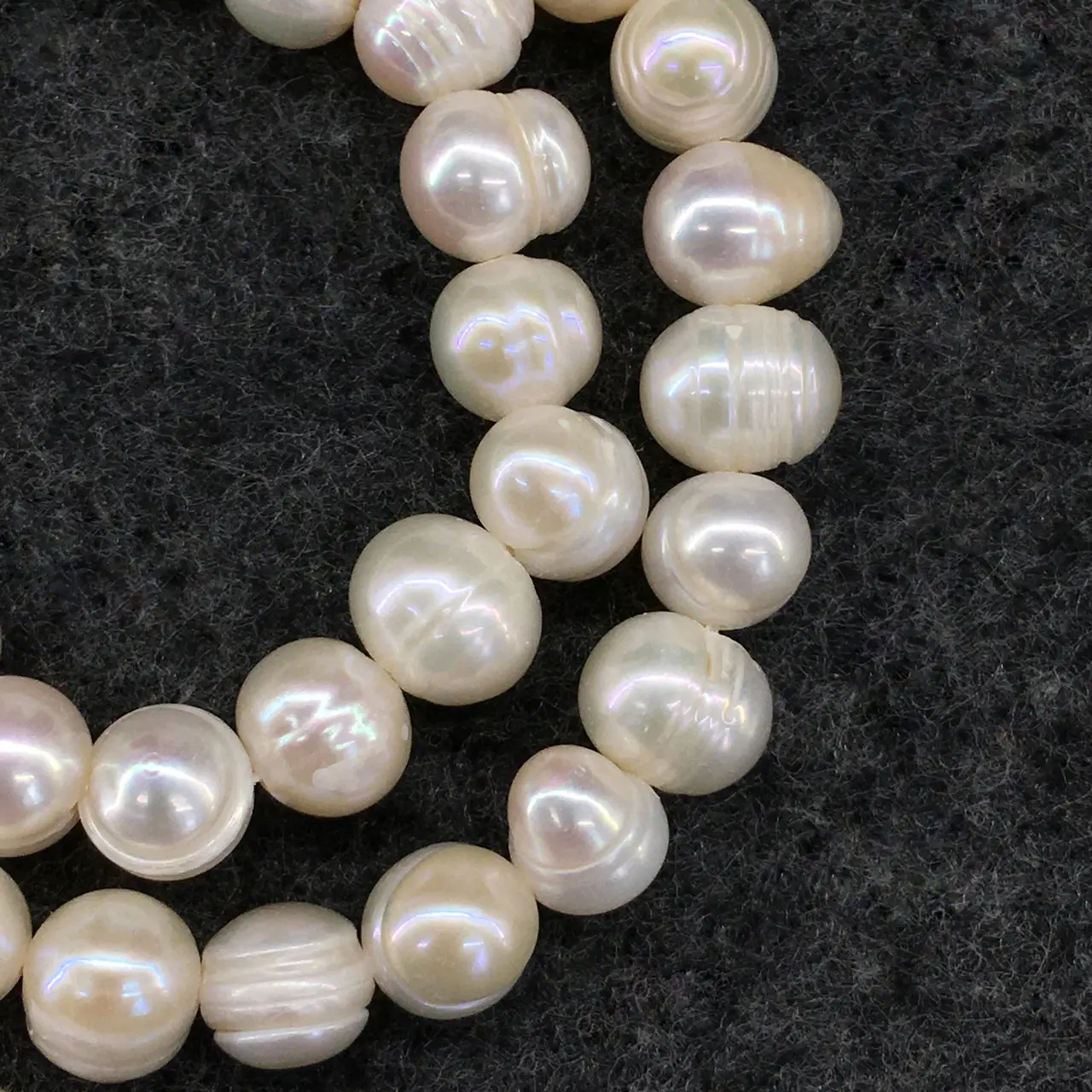 Beads from white river pearls, bead 10-11 mm